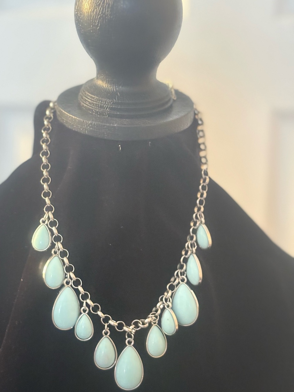 Silver Teardrop Pendant Necklace with Light Blue Accents